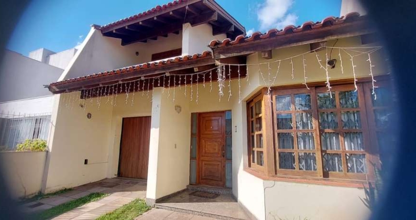 Casa com 3 quartos à venda na Rua Campos Elíseos, 78, Glória, Porto Alegre