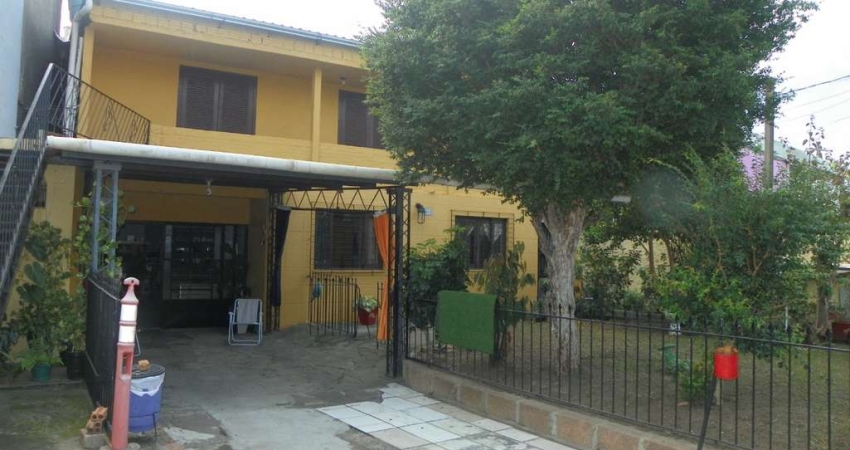 Casa com 3 quartos à venda na Avenida Monte Cristo, 515, Vila Nova, Porto Alegre