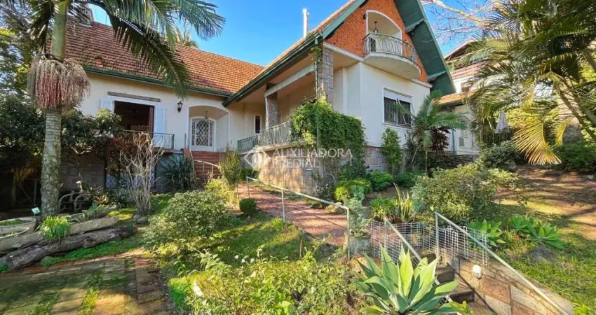 Casa com 4 quartos à venda na POSSIDONIO DA CUNHA, 16, Menino Deus, Porto Alegre