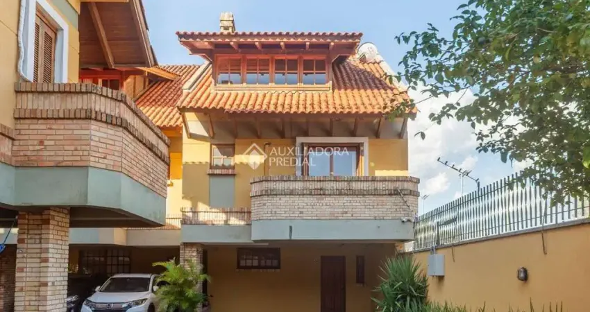 Casa em condomínio fechado com 3 quartos à venda na Avenida Coronel Marcos, 2171, Pedra Redonda, Porto Alegre