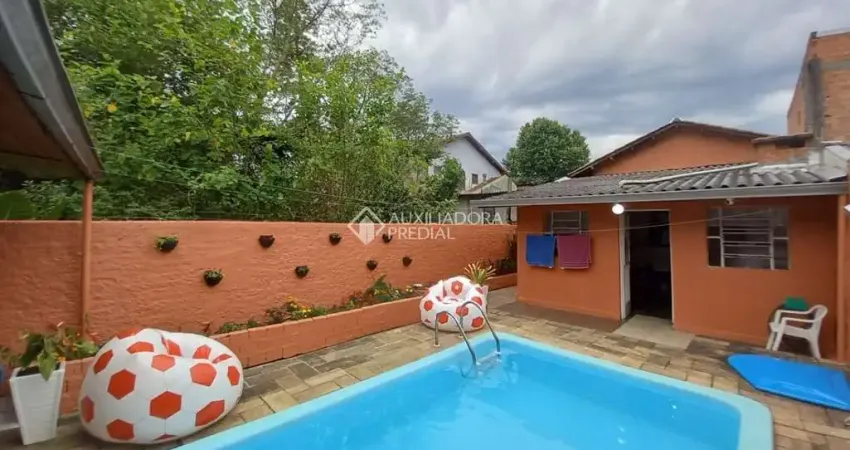 Casa com 3 quartos à venda na Rua Paulino Azurenha, 1253, Partenon, Porto Alegre