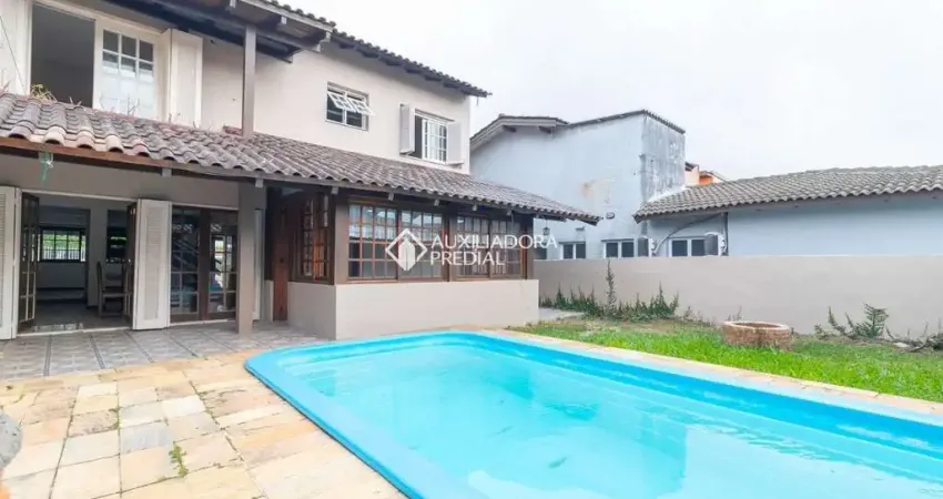 Casa com 4 quartos à venda na Avenida Guaíba, 13166, Serraria, Porto Alegre