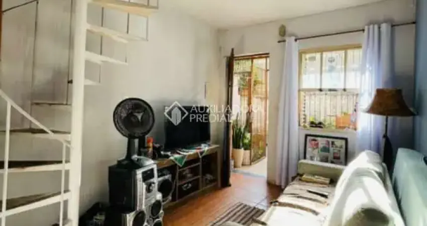 Casa em condomínio fechado com 2 quartos à venda na Rua Mura, 371, Guarujá, Porto Alegre