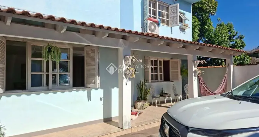 Casa com 4 quartos à venda na Avenida José Corrêa da Silva, 547, Cavalhada, Porto Alegre