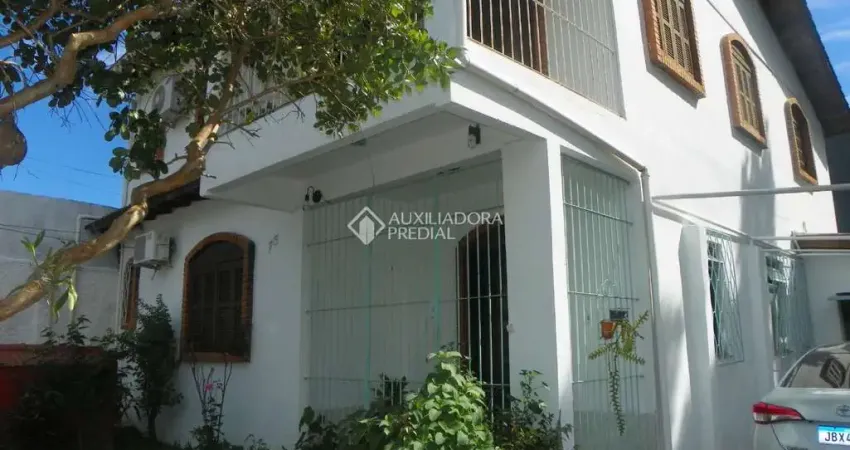 Casa com 6 quartos à venda na Rua Adroaldo Novo Correa, 75, Cavalhada, Porto Alegre