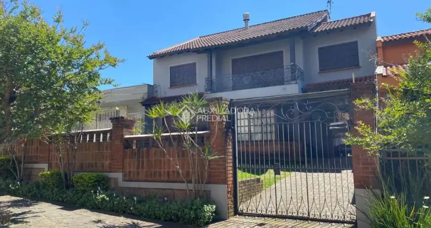 Casa com 4 quartos à venda na Rua Caiapó, 132, Cristal, Porto Alegre
