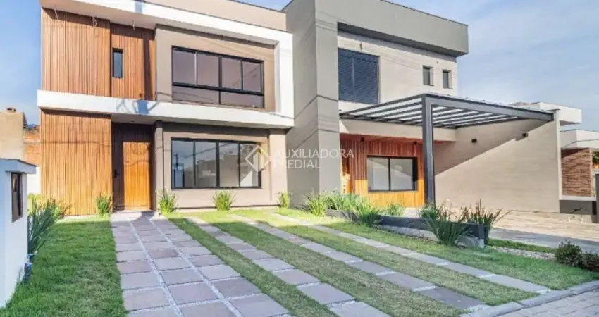 Casa em condomínio fechado com 3 quartos à venda na Rua Sinai, 41, Ipanema, Porto Alegre