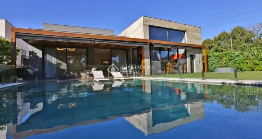 Casa em condomínio fechado com 5 quartos à venda na Avenida Juca Batista, 8000, Chapéu do Sol, Porto Alegre