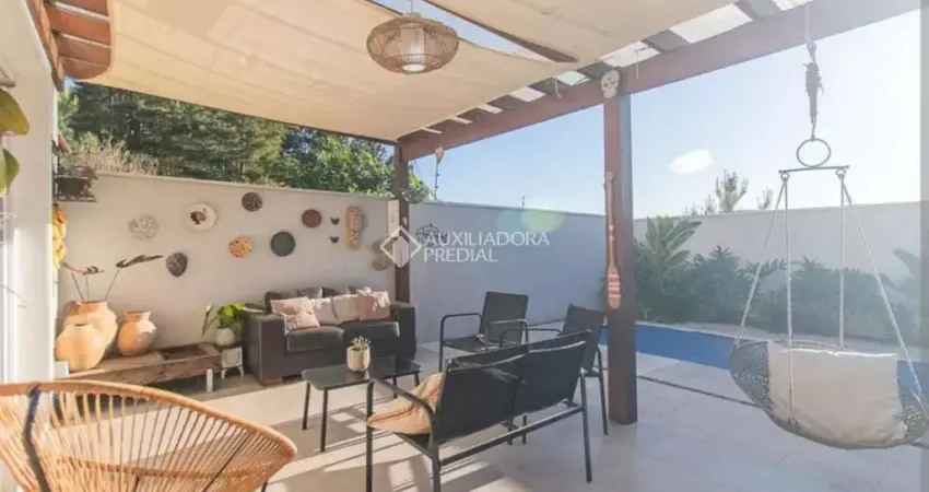 Casa com 3 quartos à venda na Avenida Juca Batista, 41, Hípica, Porto Alegre