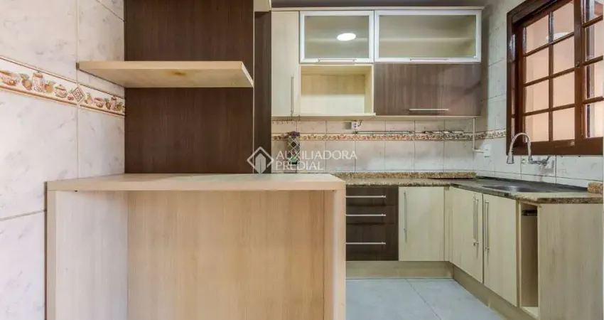 Casa em condomínio fechado com 3 quartos à venda na Avenida Edgar Pires de Castro, 1286, Hípica, Porto Alegre