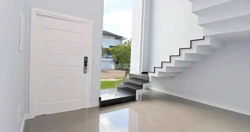 Casa em condomínio fechado com 4 quartos à venda na Estrada das Três Meninas, 1501, Vila Nova, Porto Alegre