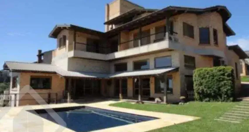 Casa em condomínio fechado com 5 quartos à venda na Rua Bazilio Pellin Filho, 880, Vila Conceição, Porto Alegre