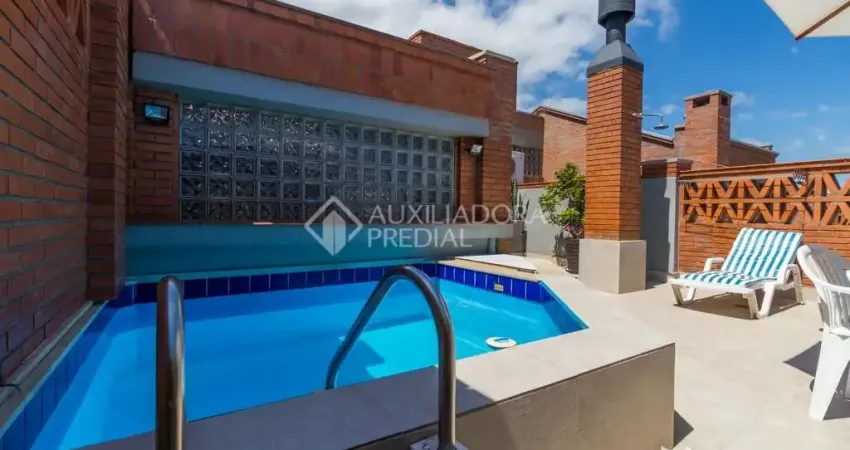 Casa em condomínio fechado com 3 quartos à venda na Avenida Jacuí, 978, Cristal, Porto Alegre