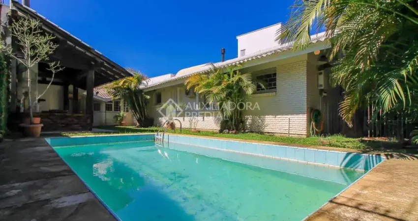 Casa em condomínio fechado com 3 quartos à venda na Rua Doutor Benjamin Camozato, 70, Jardim Isabel, Porto Alegre