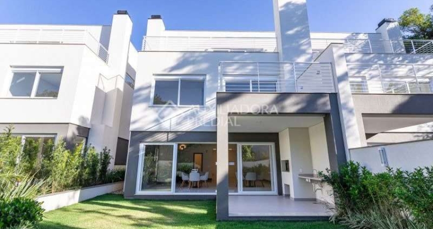 Casa em condomínio fechado com 3 quartos à venda na Rua Doutor Ney de Castilhos Ferreira, 300, Pedra Redonda, Porto Alegre