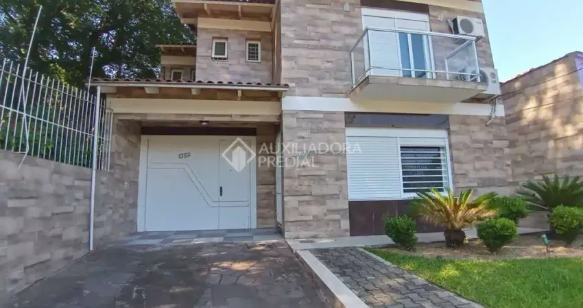 Casa com 3 quartos à venda na Rua Sepé Tiaraju, 1352, Nonoai, Porto Alegre
