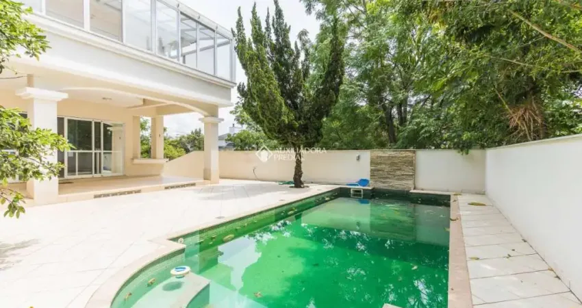 Casa com 5 quartos à venda na Rua das Tibiras, 241, Jurerê Internacional, Florianópolis