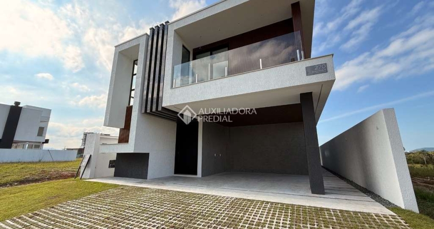 Casa com 3 quartos à venda na Avenida Governador Celso Ramos, 3300, Jardim Dourado, Porto Belo