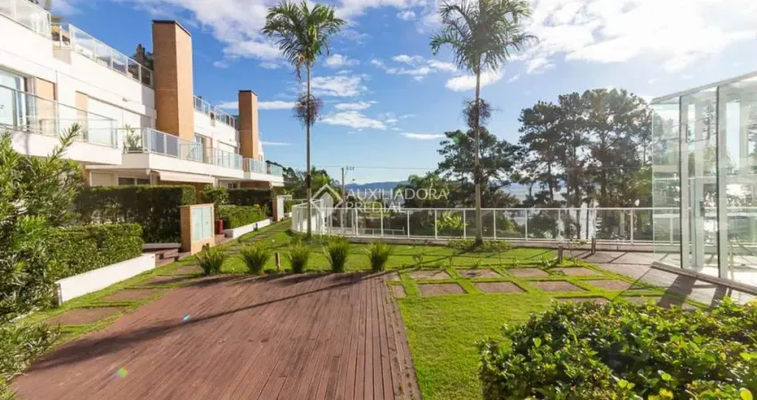 Casa em condomínio fechado com 4 quartos à venda na Rodovia Haroldo Soares Glavan, 3430, Cacupé, Florianópolis