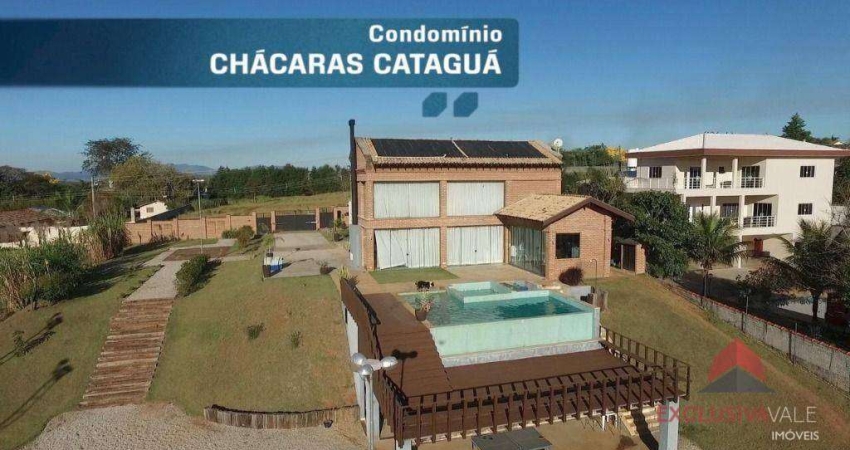 Casa com 3 dormitórios, 700 m² - venda por R$ 3.950.000,00 ou aluguel por R$ 18.592,00/mês - Chácaras Cataguá - Taubaté/SP