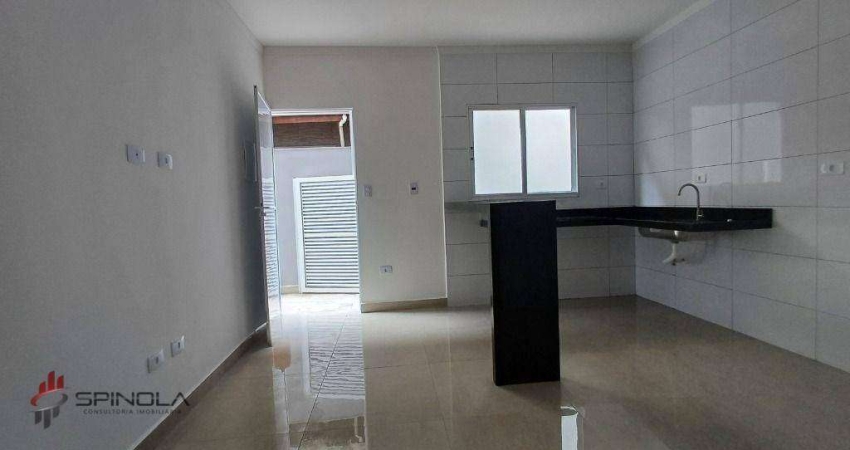Casa com 2 dormitórios à venda, 70 m² por R$ 450.000,00 - tude basto - Praia Grande/SP