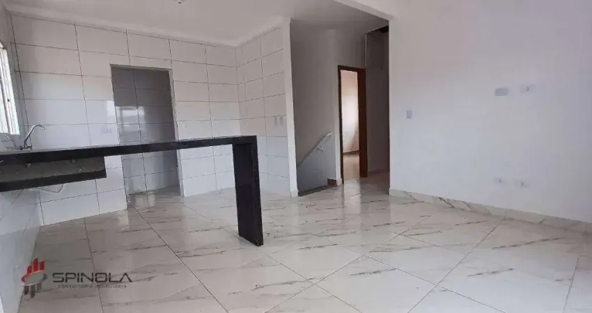 Casa com 2 dormitórios à venda, 70 m² por R$ 550.000,00 - tude basto - Praia Grande/SP