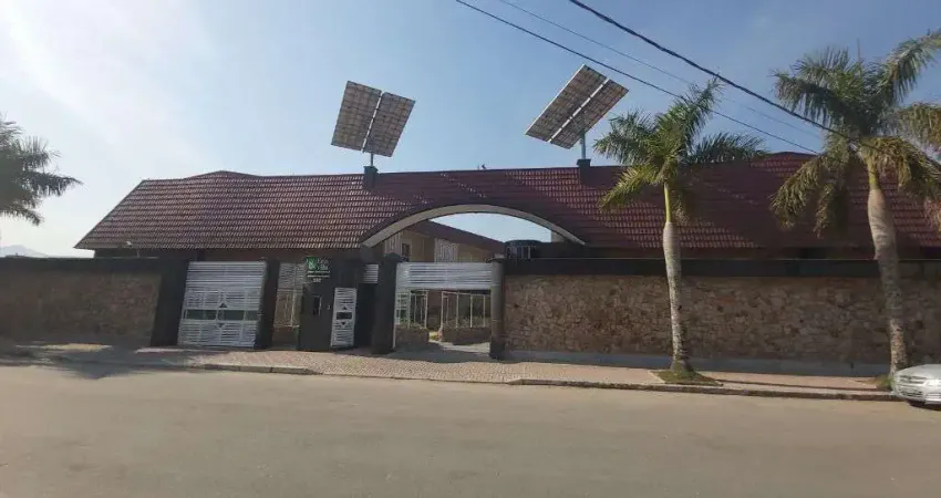 Sobrado com 4 dormitórios à venda, 221 m² por R$ 1.700.000,00 - Mirim - Praia Grande/SP