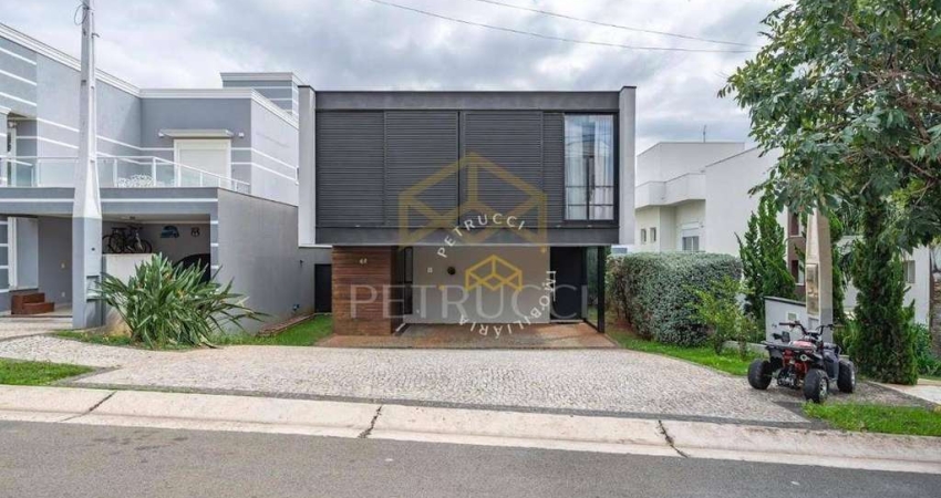 Casa com 3 dormitórios, 275 m² - venda por R$ 2.700.000,00 ou aluguel por R$ 15.125,00 - Swiss Park - Campinas/SP