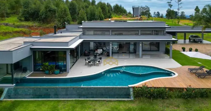 Casa com 5 dormitórios à venda, 703 m² por R$ 5.999.000,00 - Condomínio Fazenda Iracema - Campinas/SP
