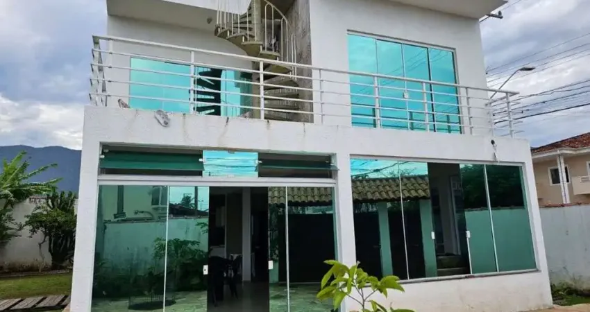 Sobrado com 4 dormitórios à venda, 220 m² por R$ 1.350.000 - Condomínio Portal Patrimonium - Caraguatatuba/SP