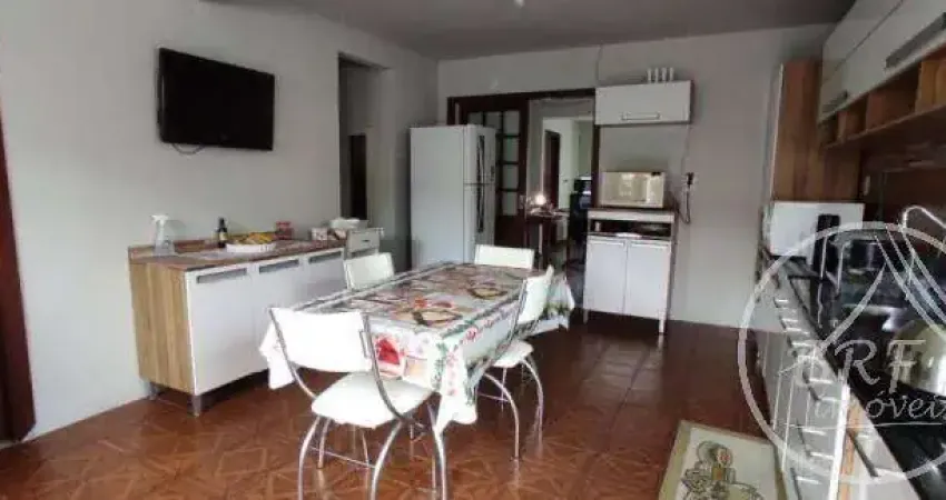 Vendo casa em Serraria São José SC de três dormitórios, sala e cozinha mais edícula