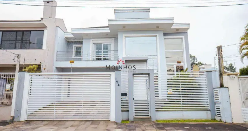 Casa com 3 quartos à venda na Rua Dinamarca, 154, Moinhos De Vento, Canoas