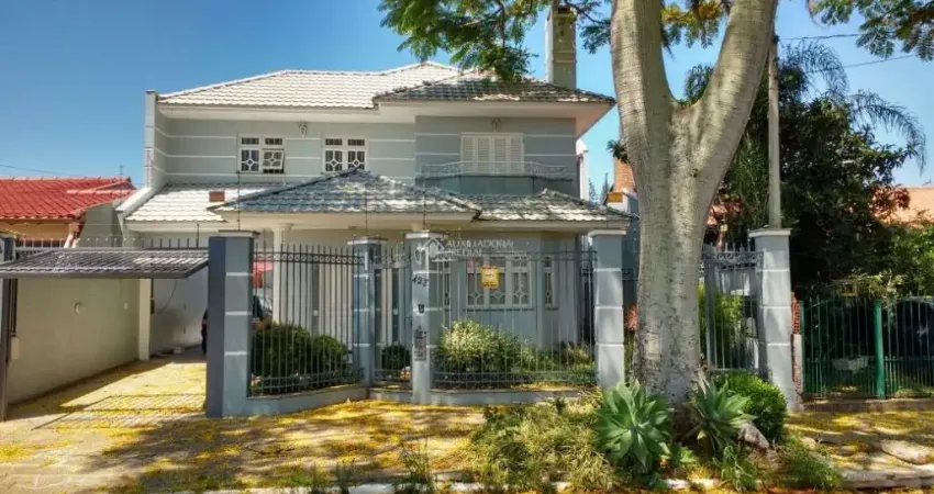 Casa com 4 quartos à venda na Rua Luís Maurício Scolari, 423, Igara, Canoas