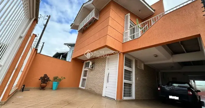 Casa com 4 quartos à venda na Rua Martinho Lutero, 125, Harmonia, Canoas