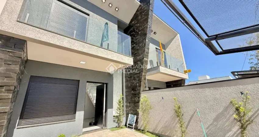 Casa com 3 quartos à venda na Rua Luis Alberto Ribeiro de Castro, 141, Estância Velha, Canoas