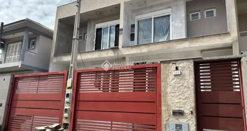Casa com 3 quartos à venda na Rua Dinamarca, 223, Estância Velha, Canoas