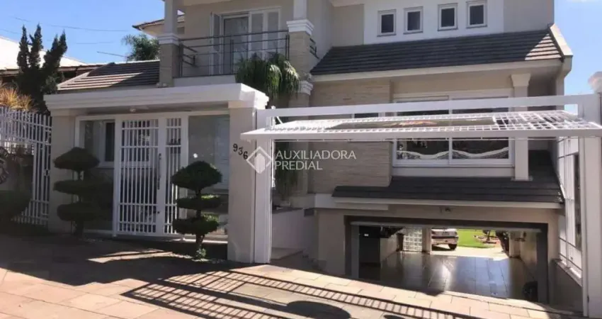 Casa com 4 quartos para alugar na Rua Araguaia, 936, Igara, Canoas