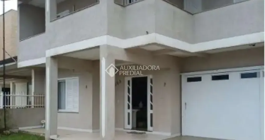 Casa com 4 quartos à venda na Rua Porto Belo, 964, Atlântida Sul (Distrito), Osório