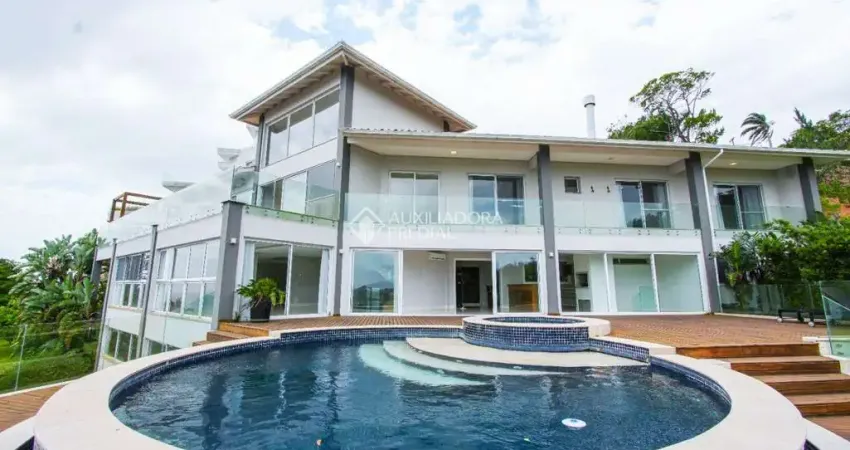 Casa em condomínio fechado com 5 quartos à venda na Rodovia Haroldo Soares Glavan, 4450, Cacupé, Florianópolis