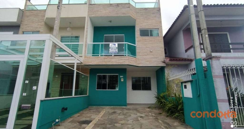 Sobrado com 3 dormitórios para alugar por R$ 5.272,00/mês - Hípica - Porto Alegre/RS