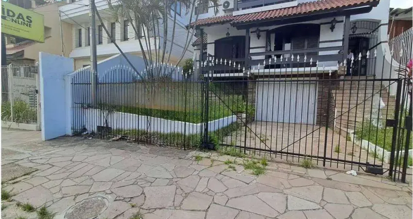 Casa com 5 dormitórios para alugar, 382 m² por R$ 7.000,00/mês - Tristeza - Porto Alegre/RS