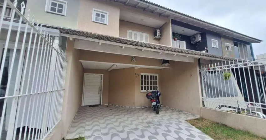 Sobrado com 3 dormitórios para alugar, 127 m² por R$ 3.672,00/mês - Hípica - Porto Alegre/RS