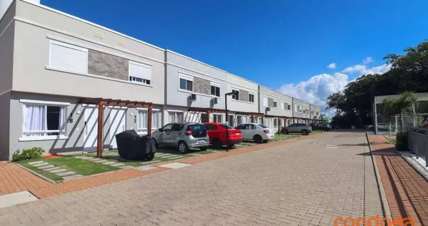 Casa com 2 dormitórios para alugar, 87 m² por R$ 2.604,70/mês - Vila Nova - Porto Alegre/RS