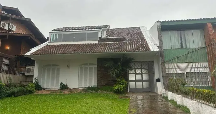 Casa com 3 dormitórios para alugar, 594 m² por R$ 11.432,16/mês - Cristal - Porto Alegre/RS