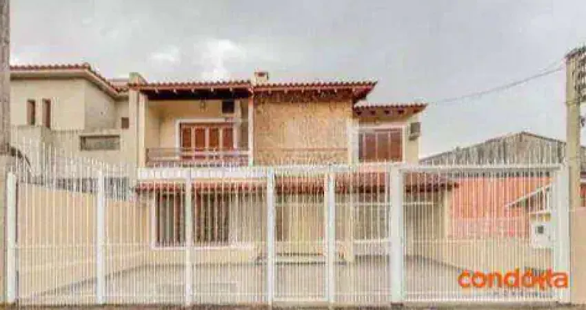 Casa com 4 dormitórios para alugar, 359 m² por R$ 8.503/mês - Aberta dos Morros - Porto Alegre/RS