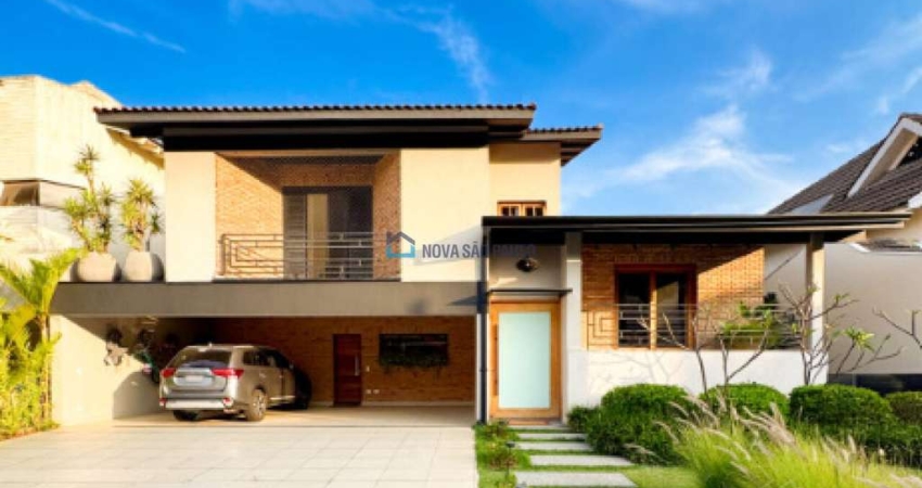 Casa de condomínio à venda com 385m², 4 quartos e 9 vagas