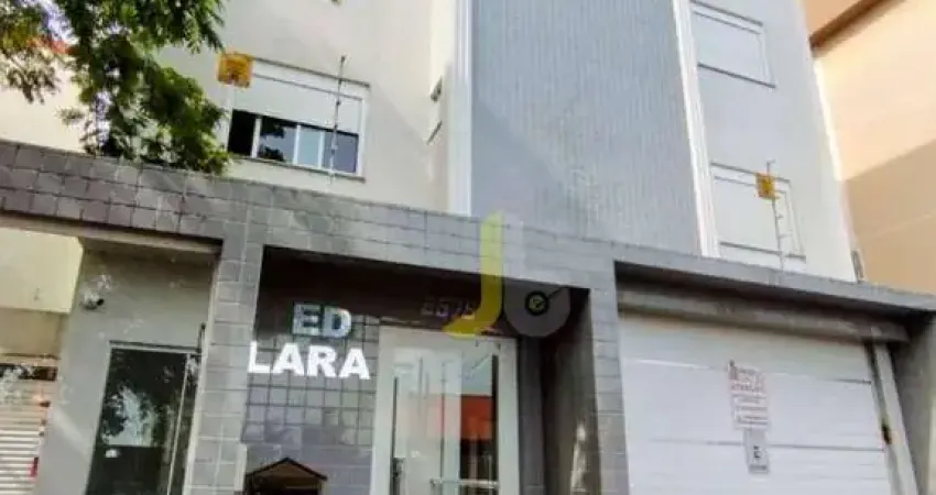 Apartamento central, com 03 quartos, planejados na cozinha e duas vagas de garagem