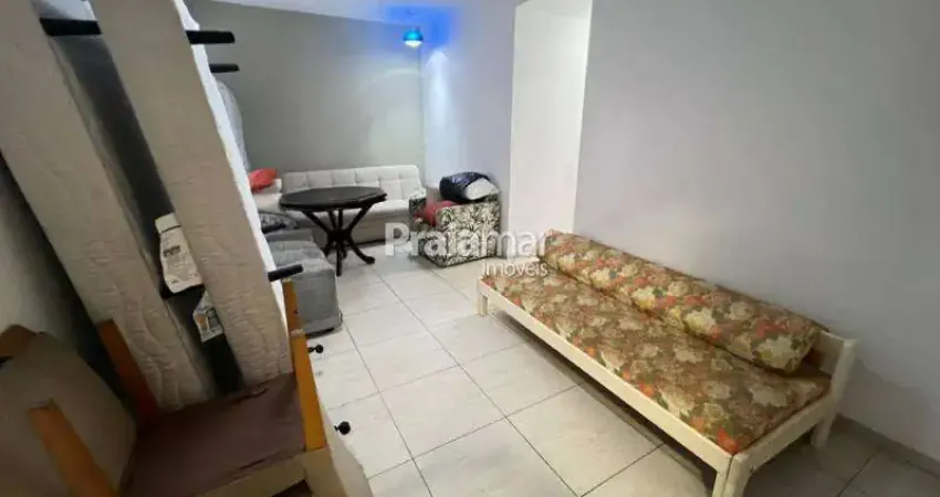 Apartamento mobiliado 2 dormitórios gonzaga santos 1 vaga frente a praia