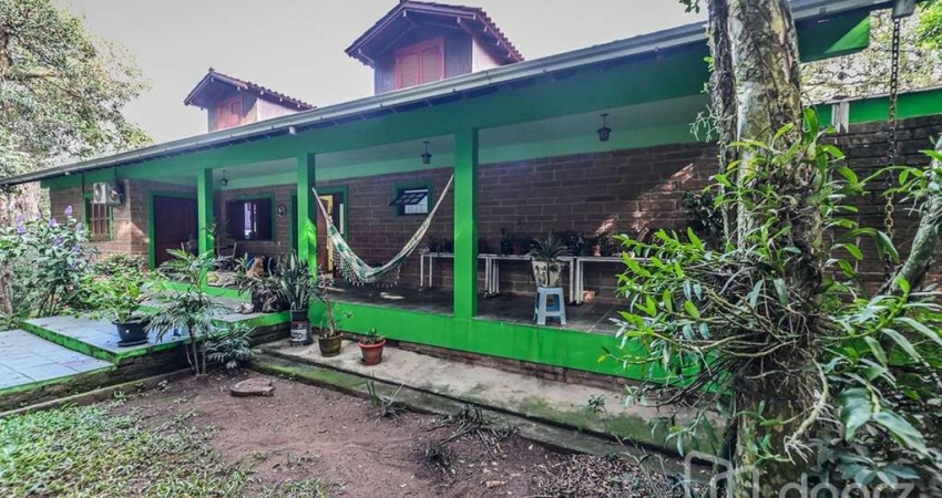 Casa com 4 quartos à venda na Rua Monteverde, 128, Cascata, Porto Alegre