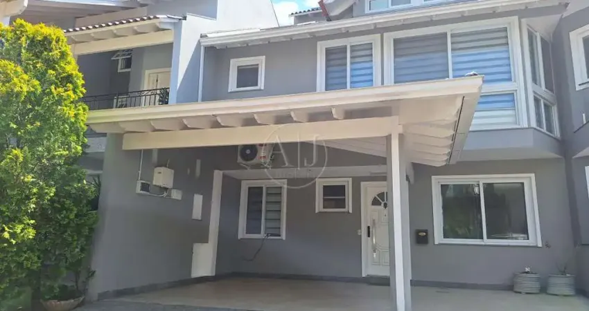 Ampla casa em condomínio, semimobiliada, 4 suítes, pátio com quiosque com churrasqueira e amplo sótão com sacada integrada!!! 3 vagas.